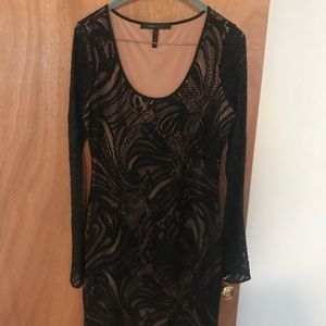 Never been worn BCBG long sleeve bodycorn dress